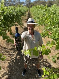 Rob in the vineyard with Cabernet Shiraz
